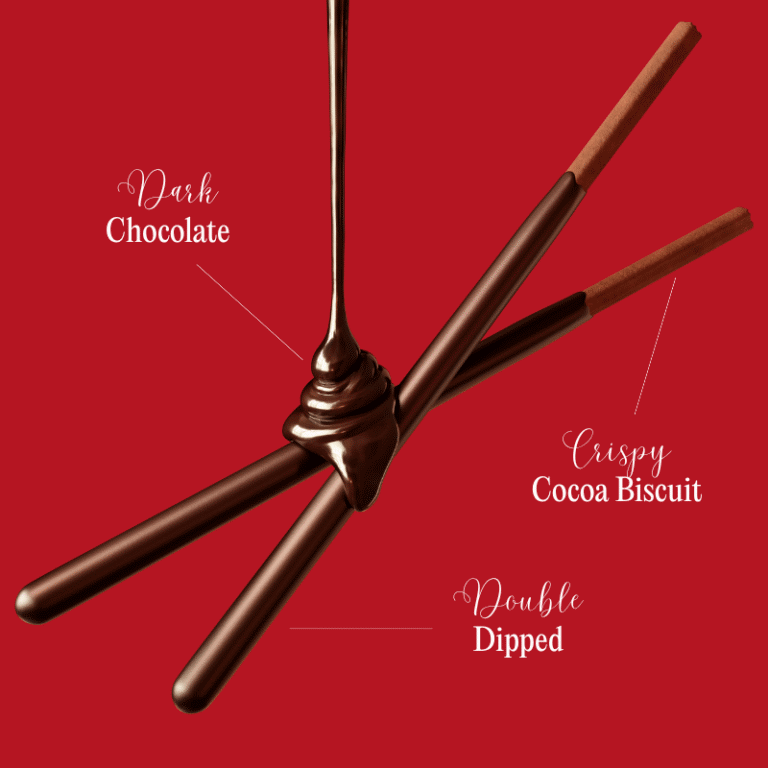 Chocolate cream dripping onto the two crossed Pocky Dark Double Dipped sticks.